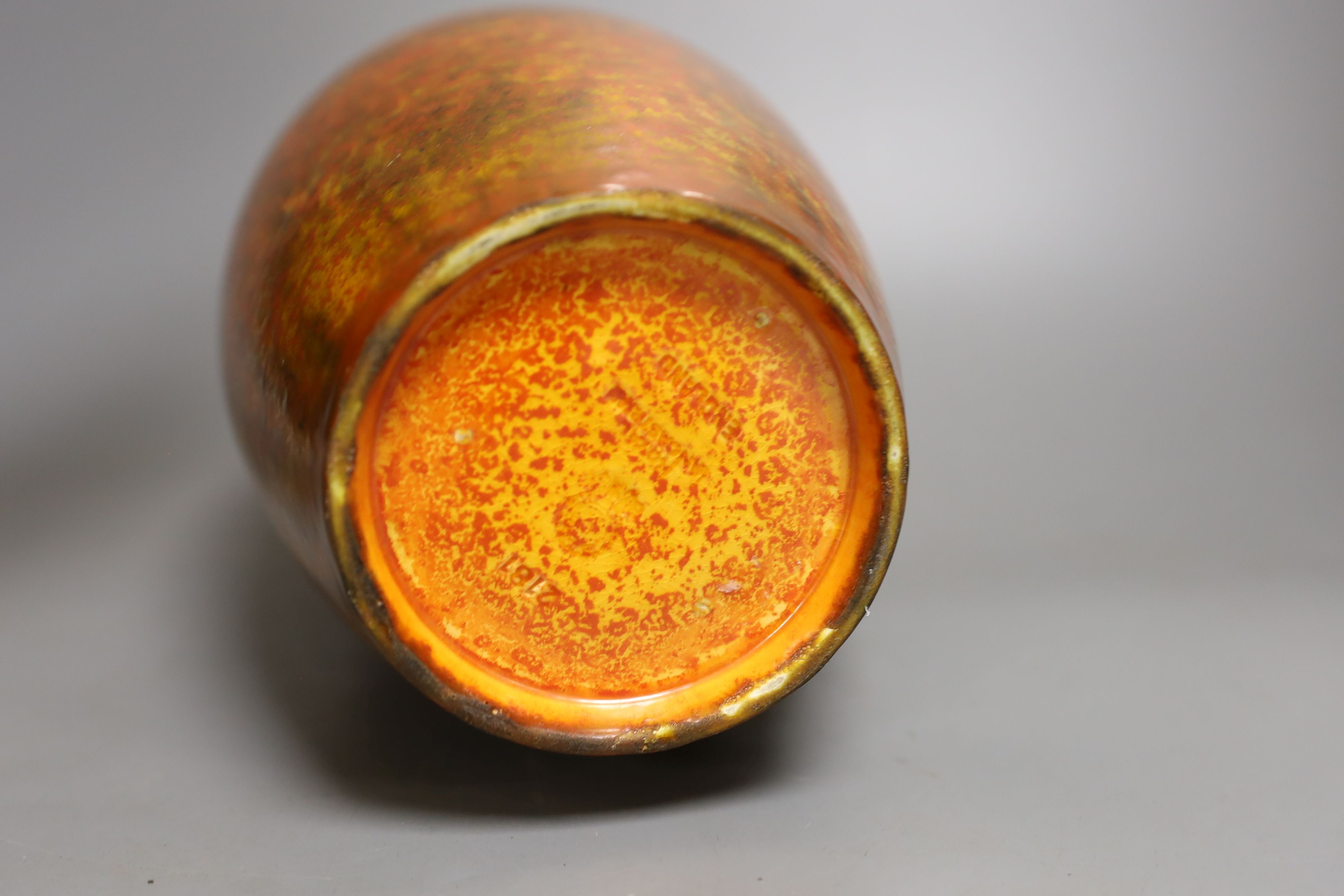 A Pilkington's Royal Lancastrian orange mottle glazed vase, 29 cms high.